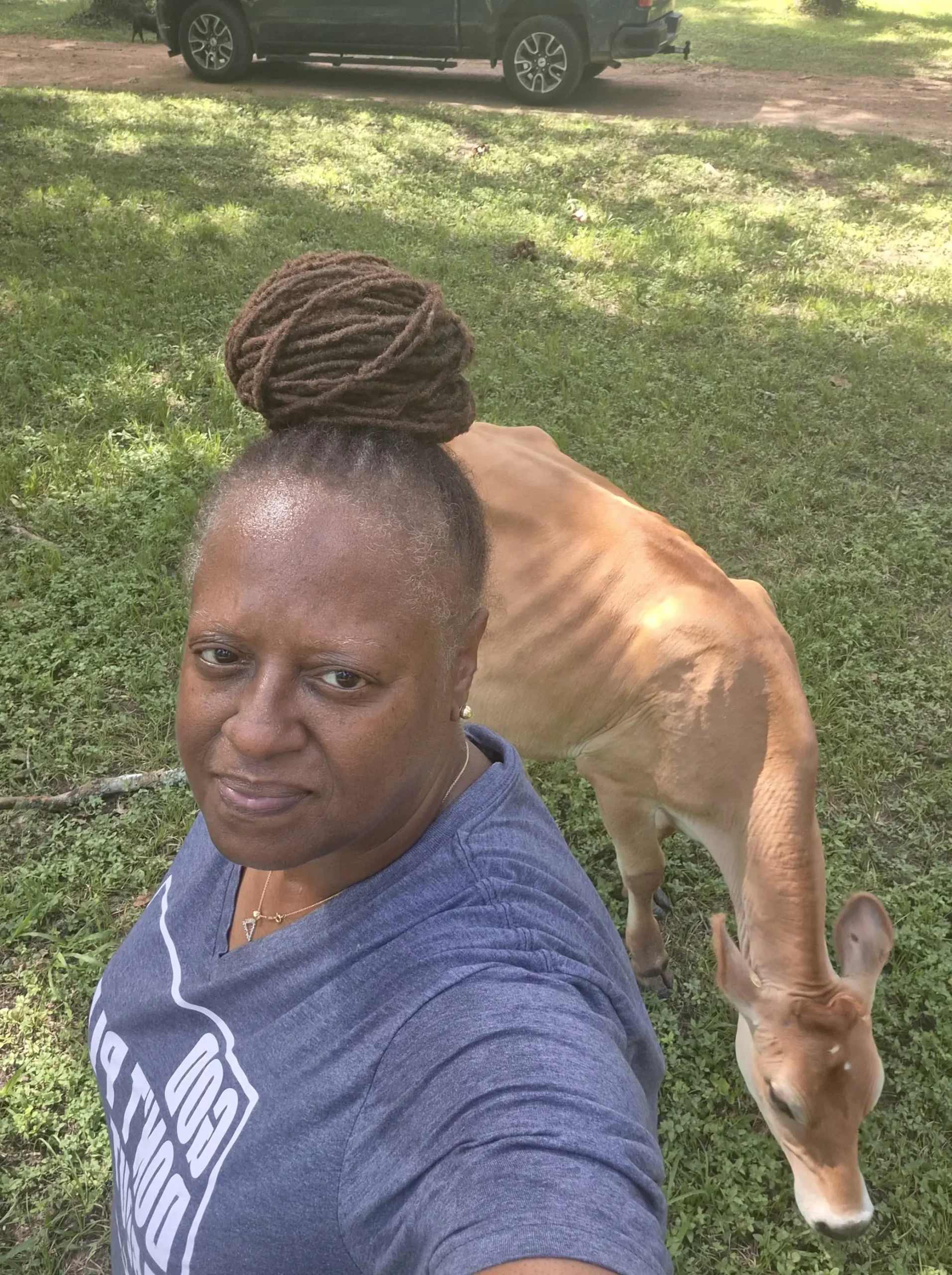 Rosalind Smith with Bella Jersey cow at Inner Peace and Happiness Ranch